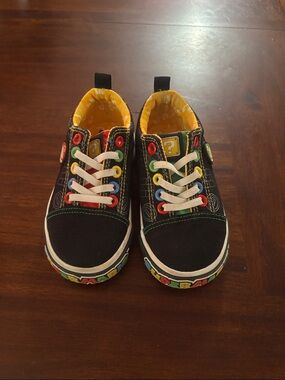 Kids Black Canvas Sneakers with Colorful Eyelets and Yellow Lining